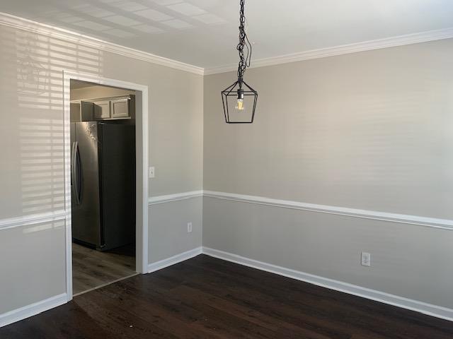 8320 Hobhouse Circle Raleigh, NC 27615 - Photo 3 of 16 a view of a room with wooden floor and white walls