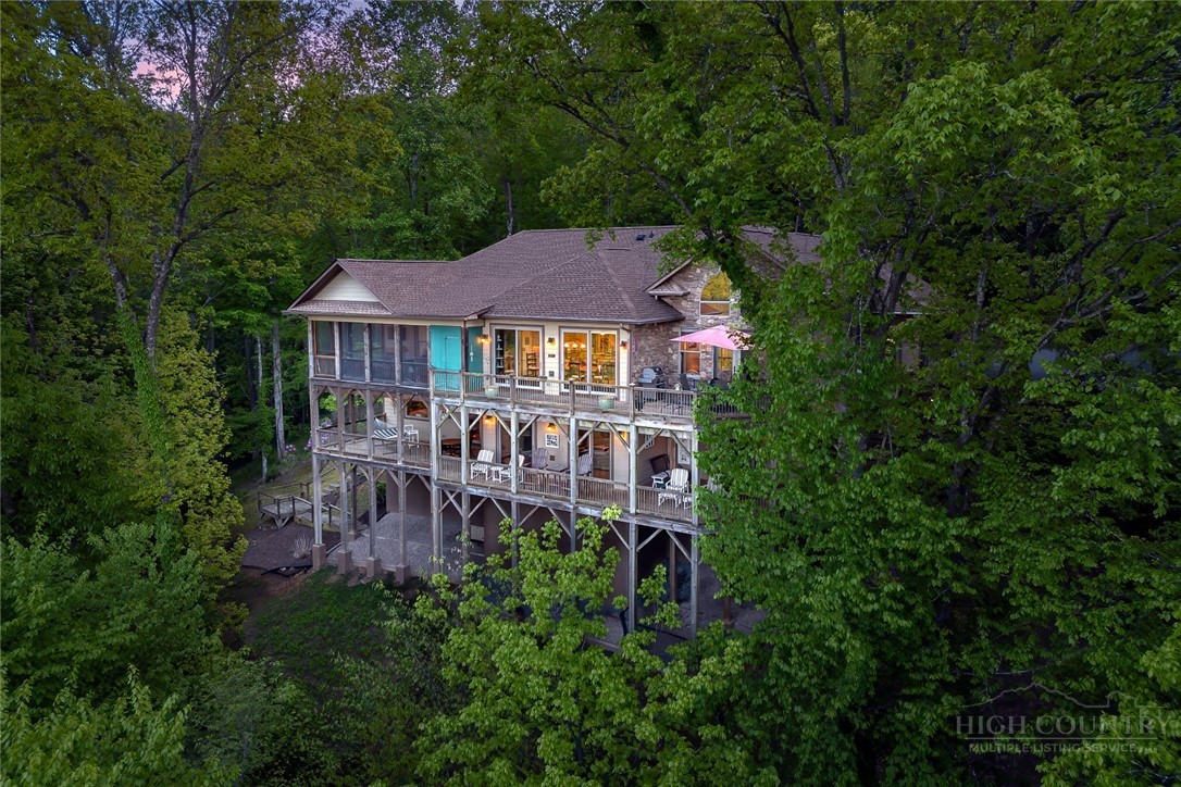171 Camp Davis Road Banner Elk, NC 28604 - Photo 44 of 48 an aerial view of a house with yard table and chairs