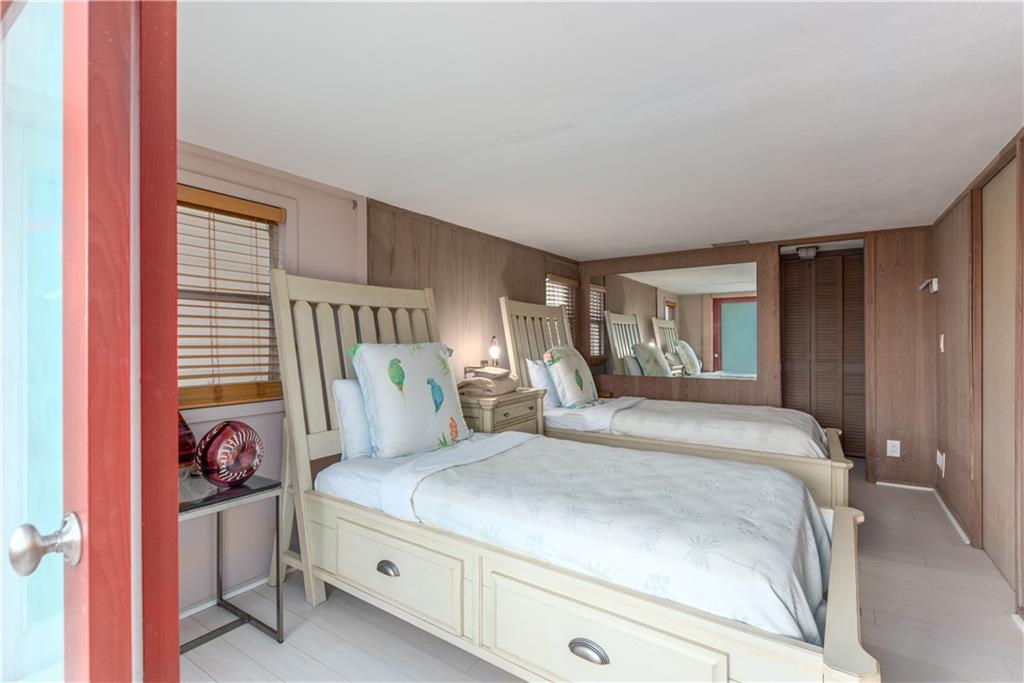 88 North Beach Road Hobe Sound, FL 33455 - Photo 13 of 30 Third bedroom on the main floor with a full bathroom.