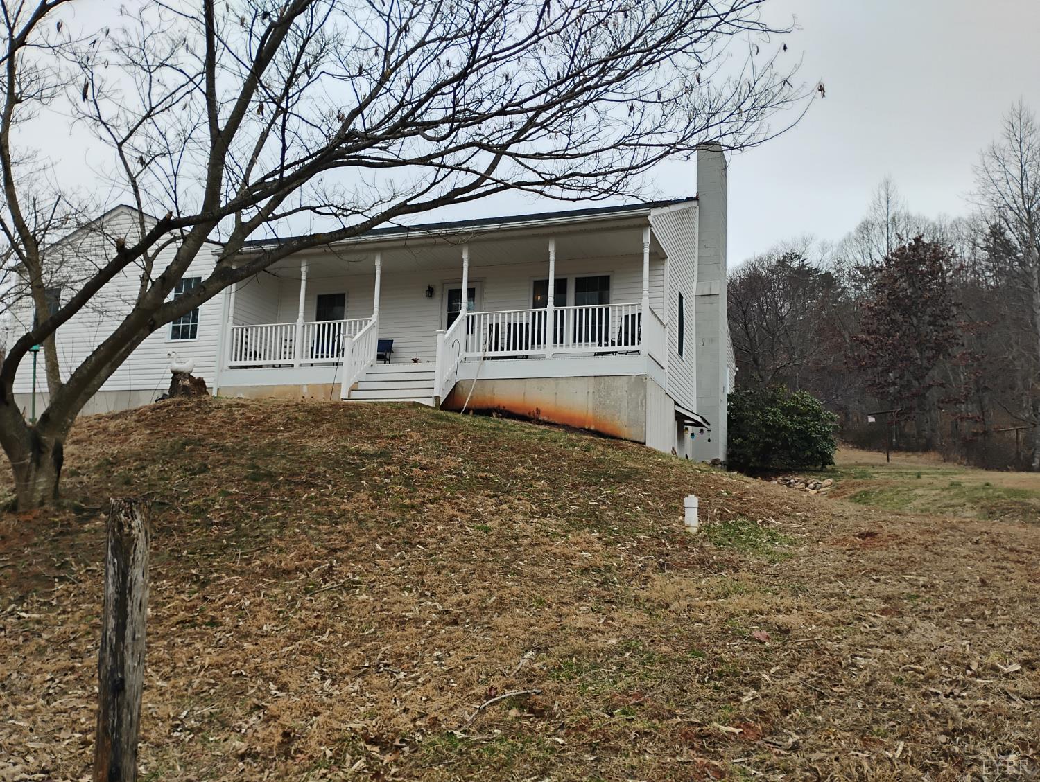 4183 Tye River Road Amherst, VA 24521 - Photo 2 of 62 a front view of a house with a yard and garage