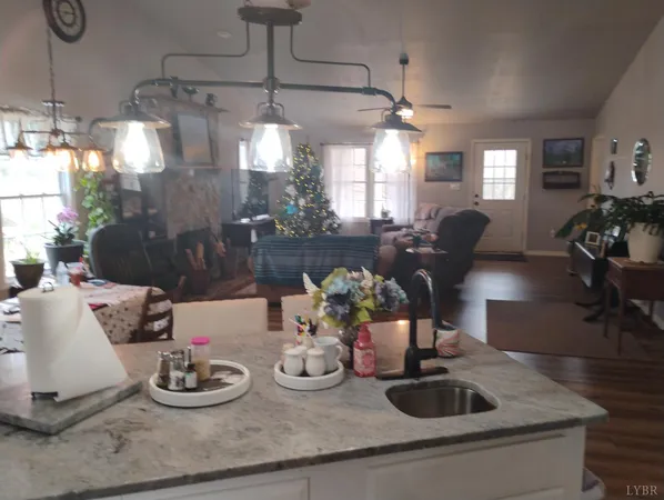 a kitchen with a table and chairs