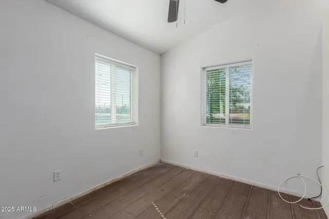 an empty room with windows