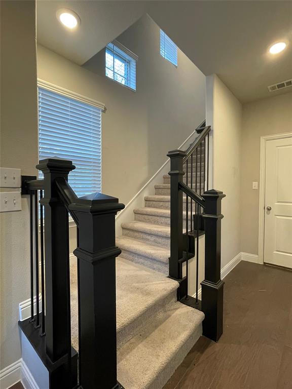 2401 Springhill Avenue Flower Mound, TX 75028 - Photo 2 of 27 a view of entryway with wooden floor and a front door