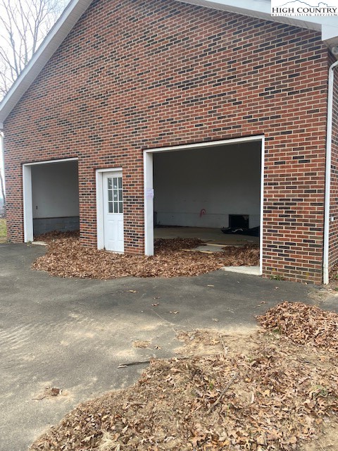 48 Saddle Mountain Church Road Ennice, NC 28623 - Photo 3 of 24 a view of a house with a yard