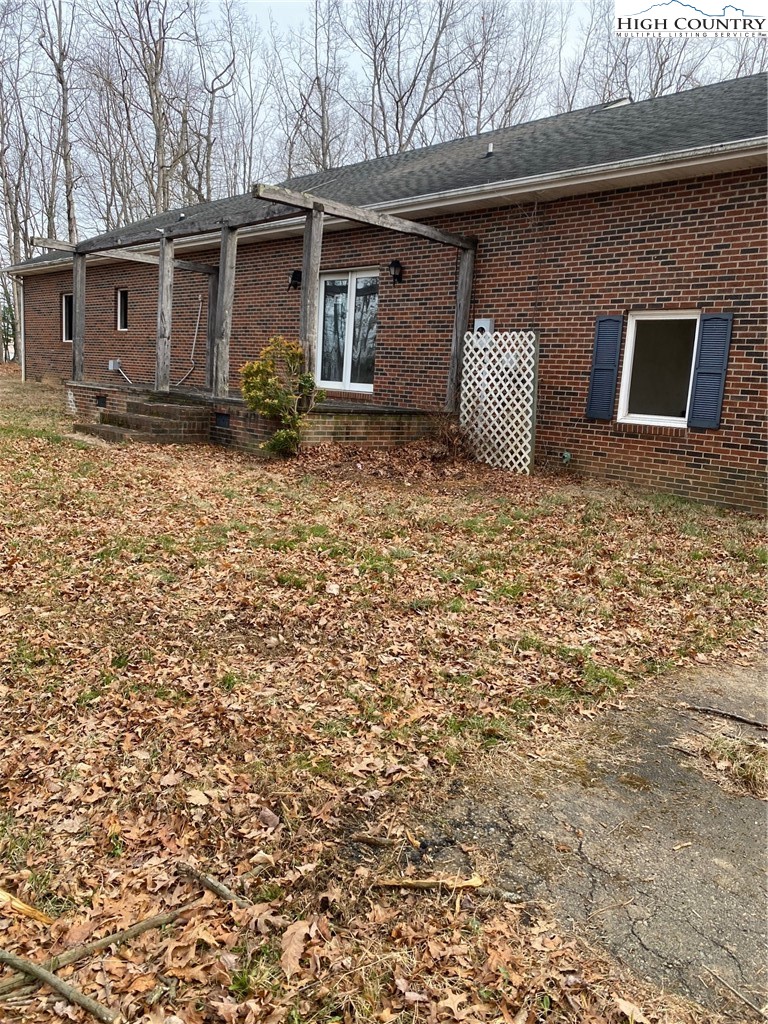 48 Saddle Mountain Church Road Ennice, NC 28623 - Photo 7 of 24 a front view of house with yard