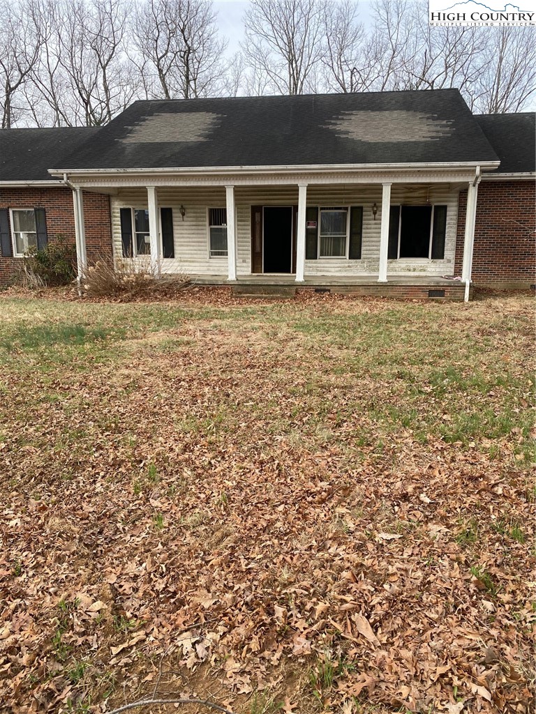 48 Saddle Mountain Church Road Ennice, NC 28623 - Photo 8 of 24 front view of a house with a yard