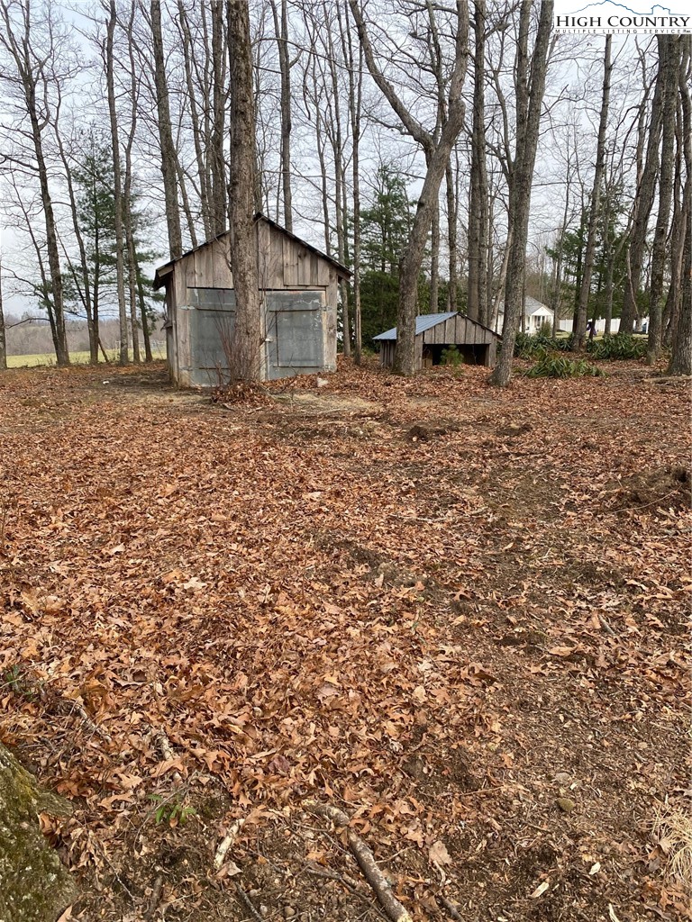 48 Saddle Mountain Church Road Ennice, NC 28623 - Photo 9 of 24 a front view of a house with a yard