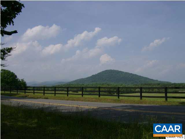 4830 Free Union Road Free Union, VA 22940 - Photo 2 of 17 a view of a golf course with a lake