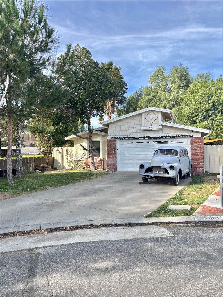 a view of a car parked on the side of the road