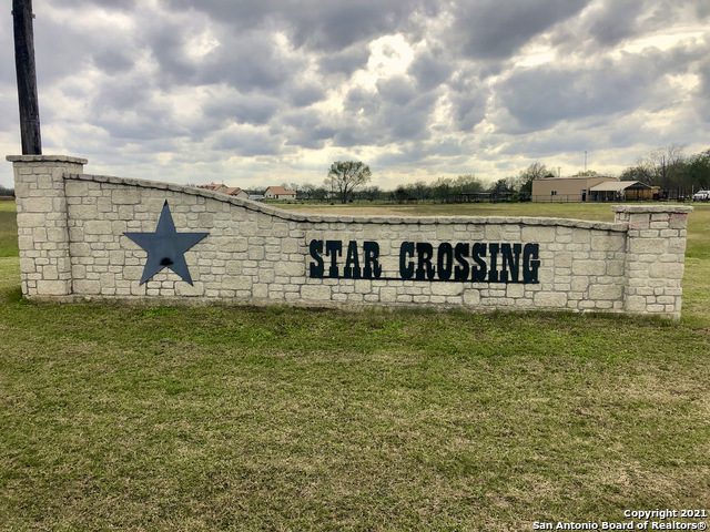 a view of a lake with a garden