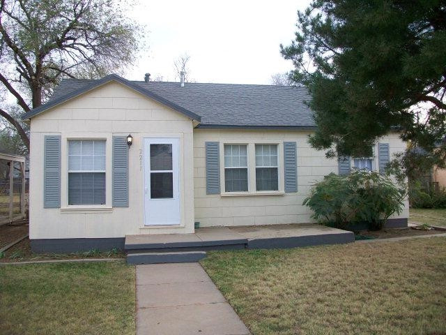 2211 26th Street Lubbock, TX 79411 - Photo 1 of 1 a front view of a house with a yard