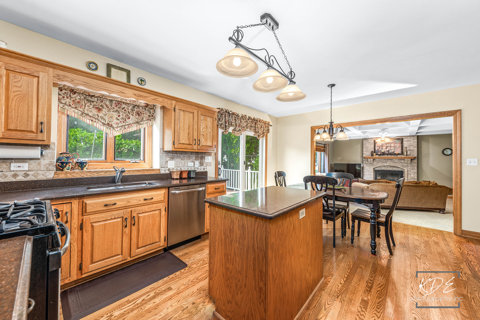 1032 Hamlet Road Naperville, IL 60564 - Photo 14 of 38 a kitchen with lots of counter top space and dining table