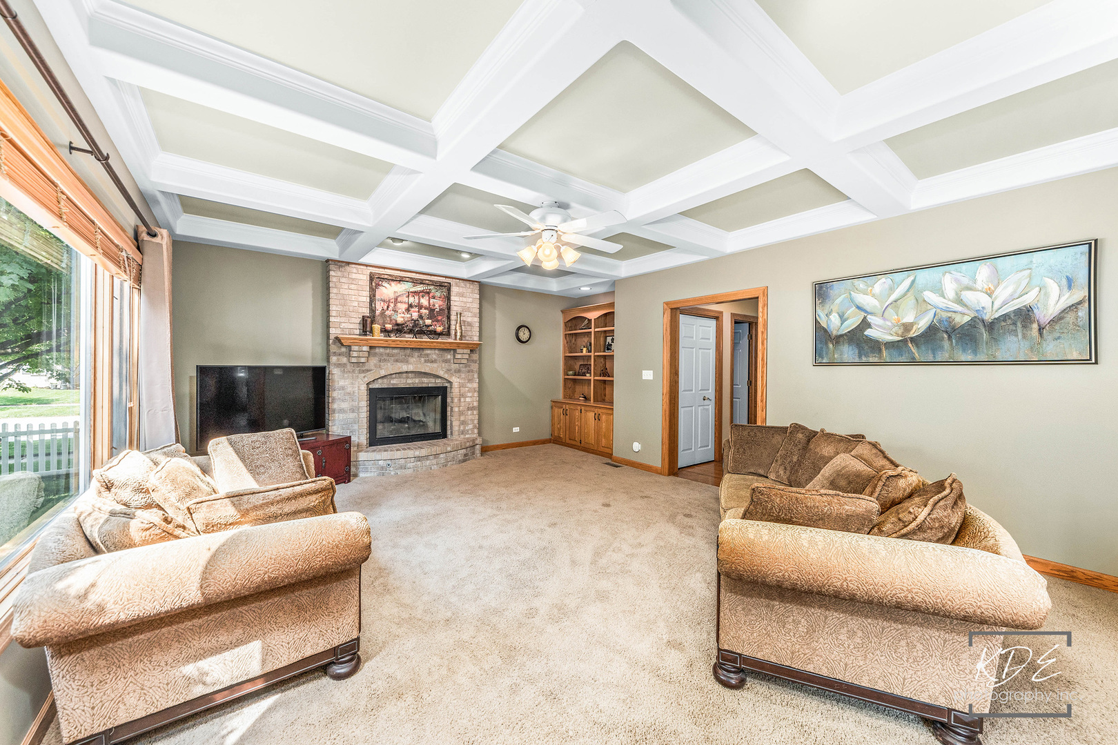 1032 Hamlet Road Naperville, IL 60564 - Photo 17 of 38 a living room with furniture and a fireplace
