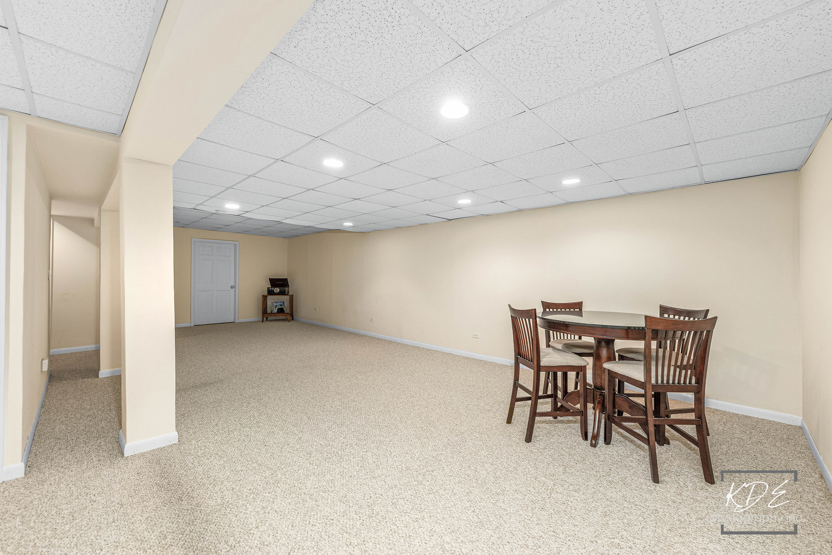 1032 Hamlet Road Naperville, IL 60564 - Photo 31 of 38 a view of a room with furniture and a dining table