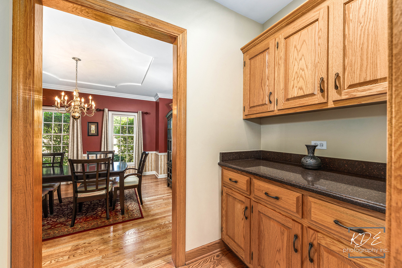 1032 Hamlet Road Naperville, IL 60564 - Photo 8 of 38 a kitchen with granite countertop a sink and cabinets