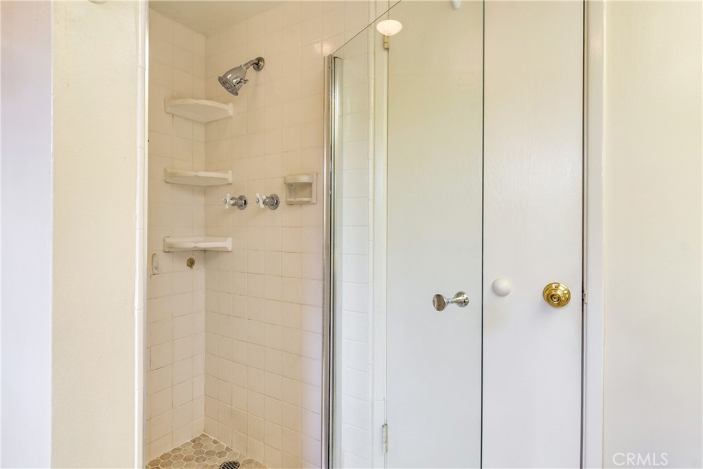 6765 Montclair Drive Riverside, CA 92504 - Photo 18 of 30 a bathroom with a shower