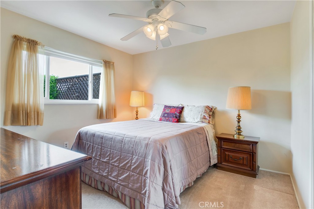 6765 Montclair Drive Riverside, CA 92504 - Photo 19 of 30 a bedroom with bed and window