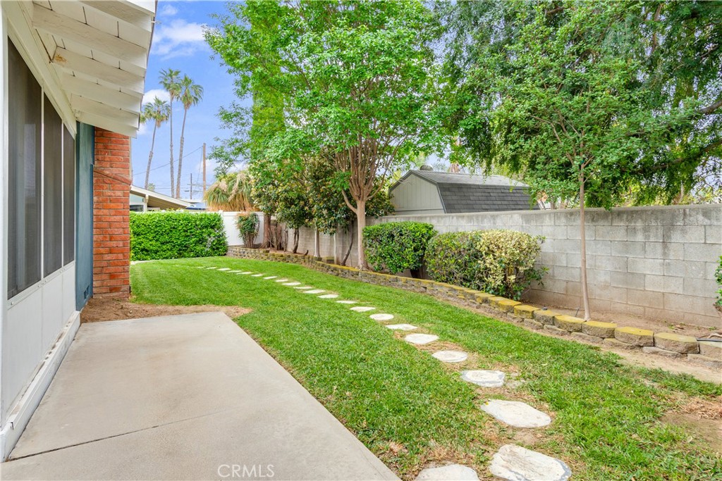 6765 Montclair Drive Riverside, CA 92504 - Photo 25 of 30 a view of a house with a yard