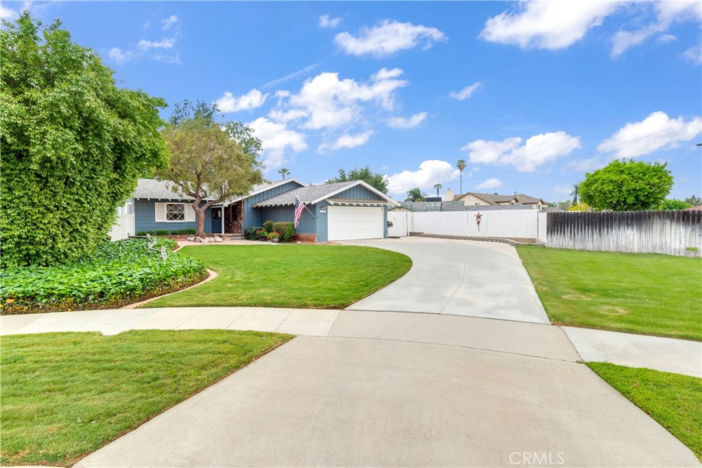 6765 Montclair Drive Riverside, CA 92504 - Photo 3 of 30 a view of house with garden