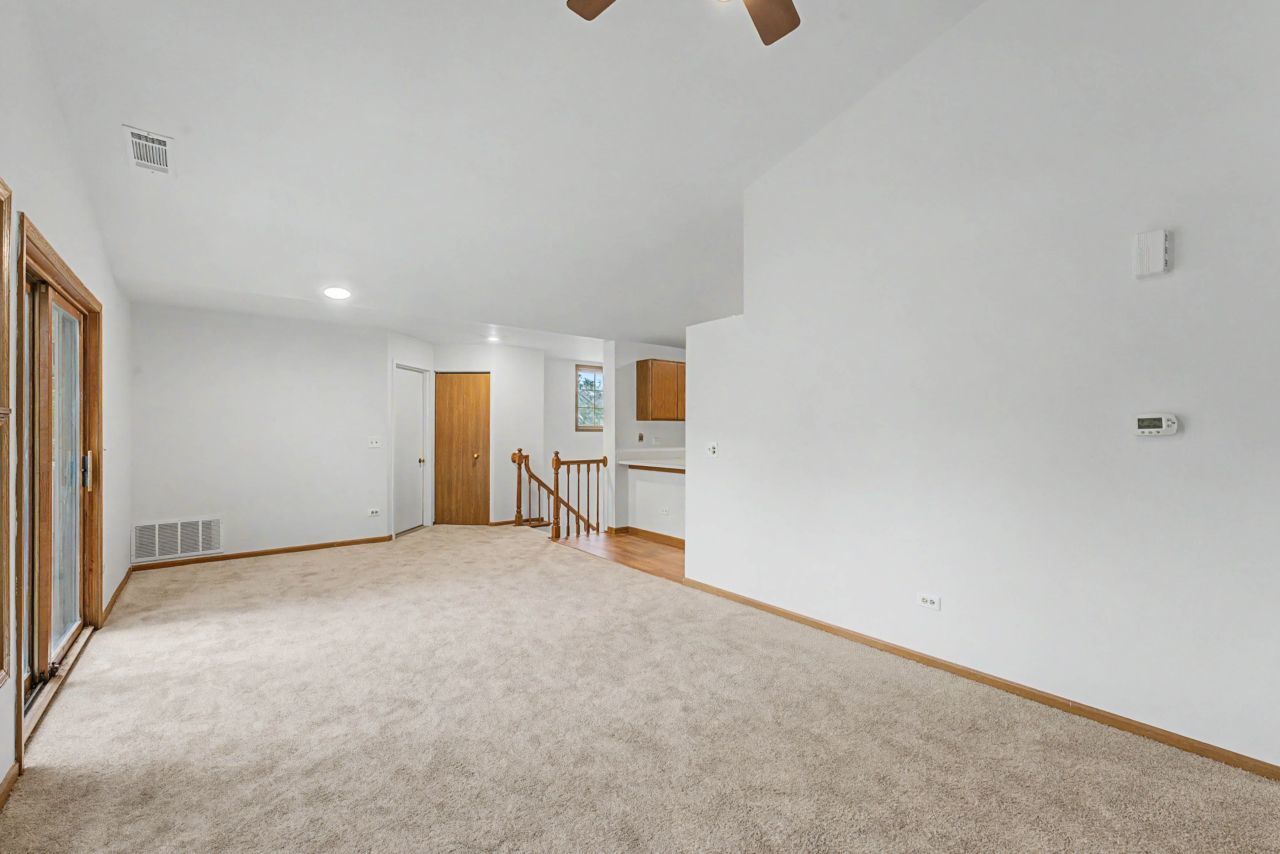 1953 North Coldspring Road Arlington Heights, IL 60004 - Photo 11 of 27 a view of an empty room with wooden floor