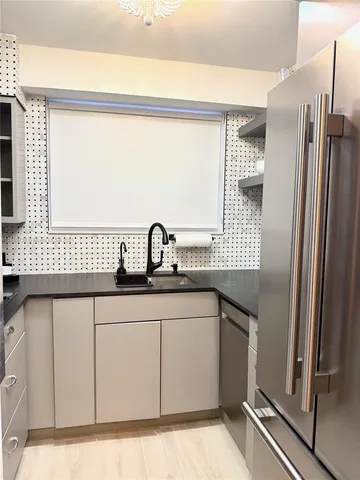 a table with a stove and a window