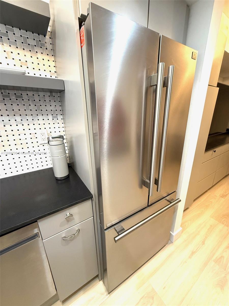 199 Southwest 12th Avenue, Unit 404A Miami, FL 33130 - Photo 26 of 65 a close view of a refrigerator and window