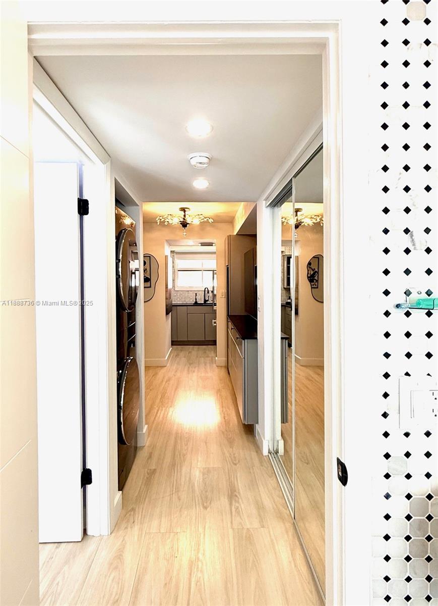 199 Southwest 12th Avenue, Unit 404A Miami, FL 33130 - Photo 34 of 65 a view of hallway with wooden floor