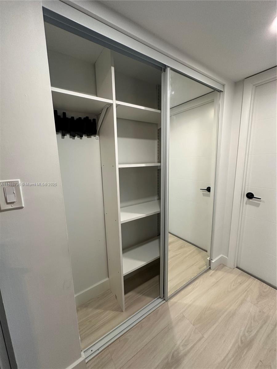 199 Southwest 12th Avenue, Unit 404A Miami, FL 33130 - Photo 35 of 65 Closet system - hallway
