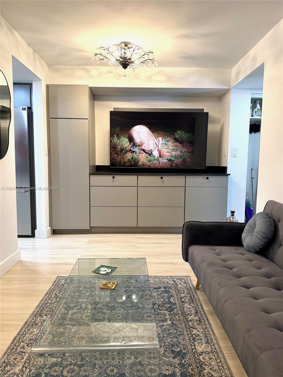 199 Southwest 12th Avenue, Unit 404A Miami, FL 33130 - Photo 5 of 65 a living room with furniture