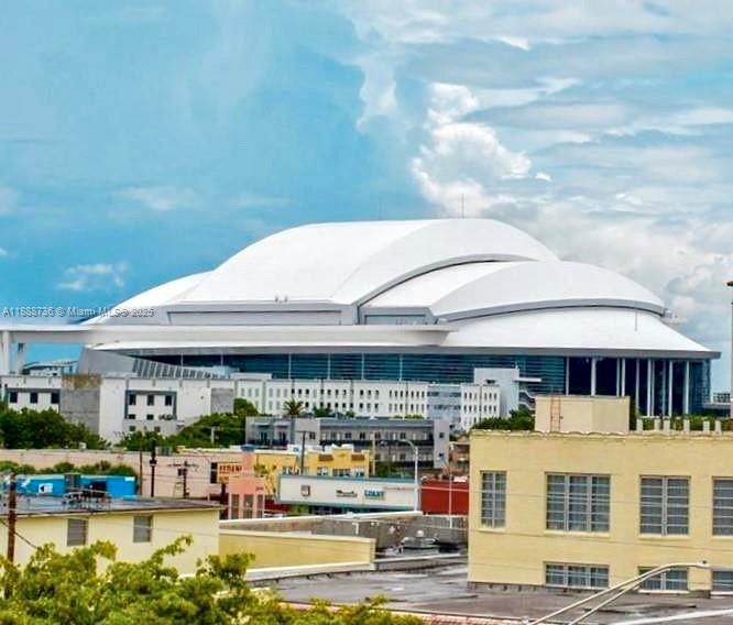 199 Southwest 12th Avenue, Unit 404A Miami, FL 33130 - Photo 63 of 65 a front view of building with lake view