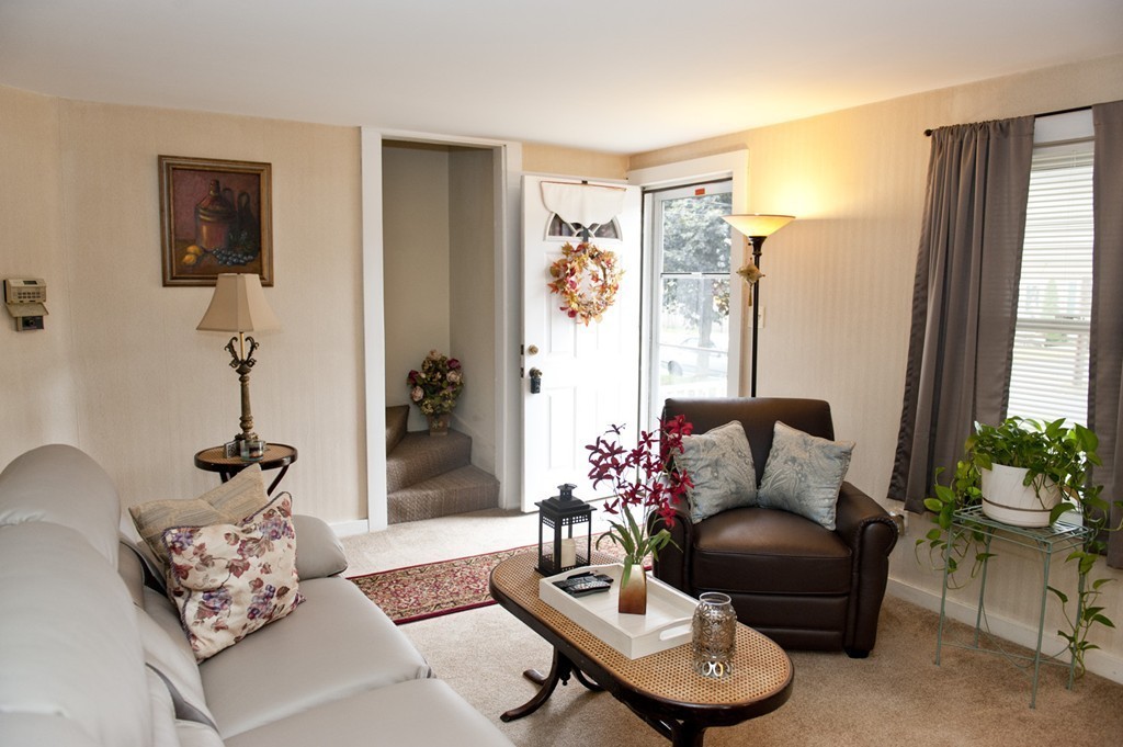79 Powell Avenue Springfield, MA 01118 - Photo 3 of 20 a living room with furniture and a large window