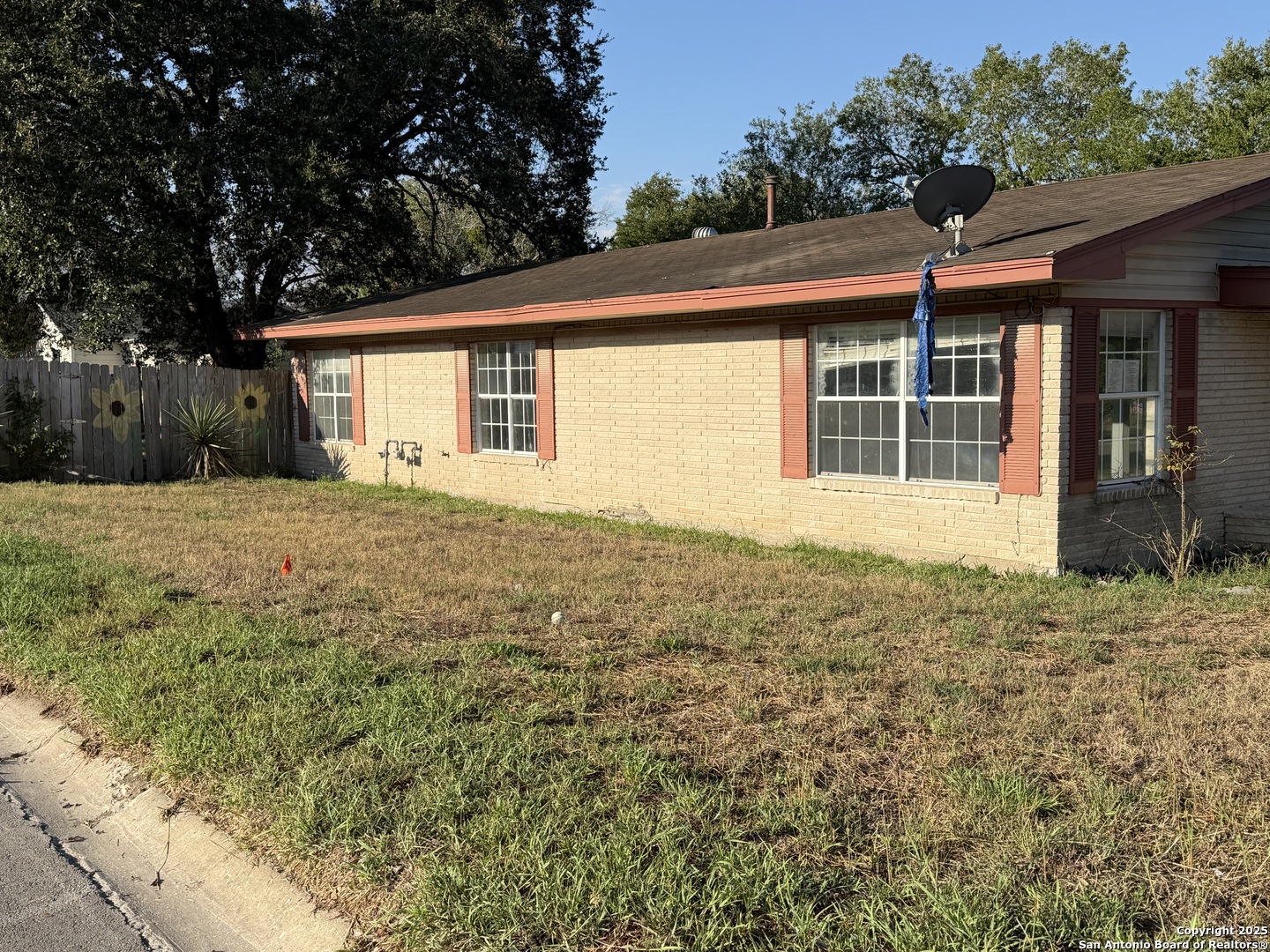 218 Graham Road Kenedy, TX 78119 - Photo 2 of 19 a front view of a house with a garden