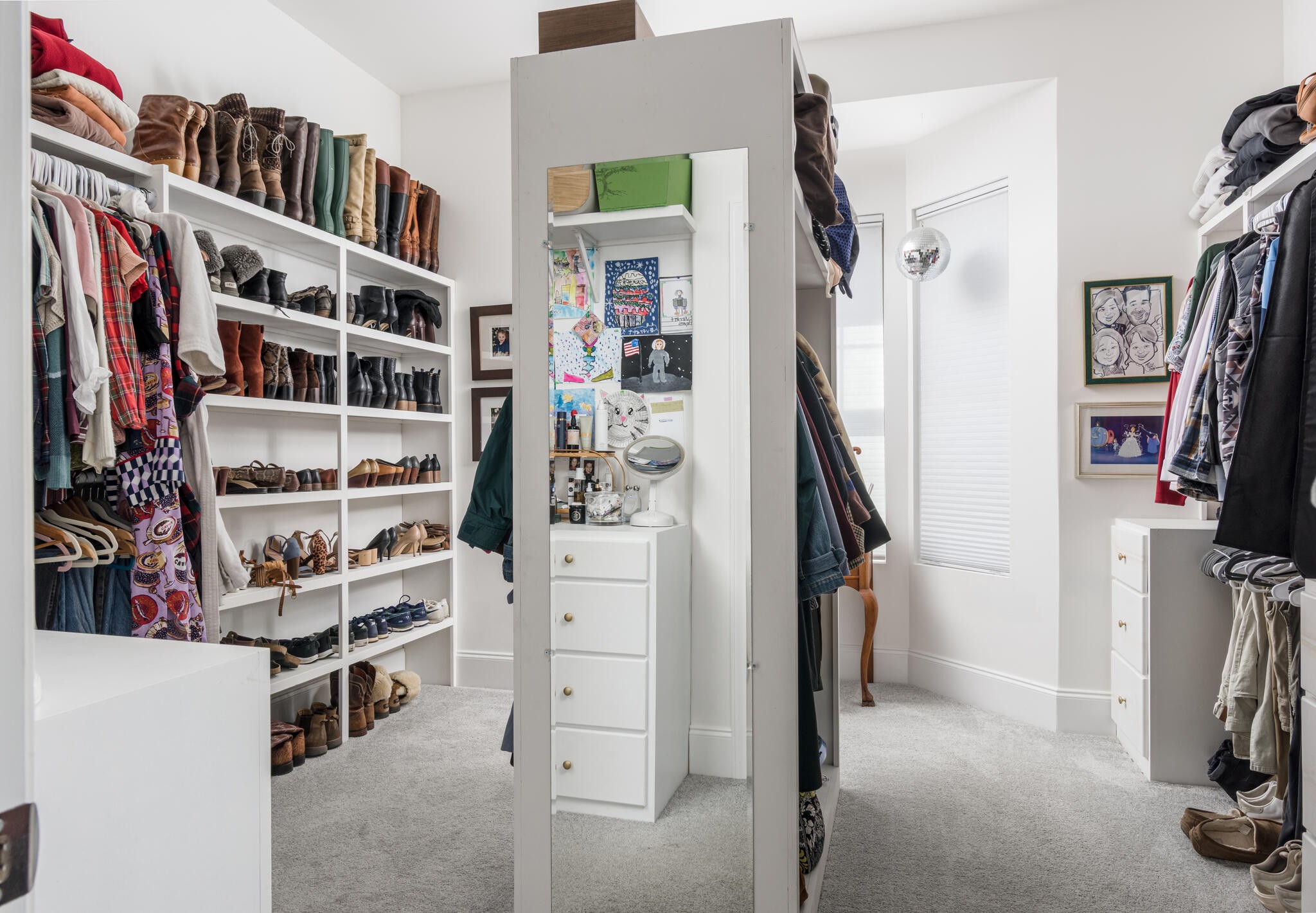8033 Still Spg Rdg Drive Nashville, TN 37221 - Photo 19 of 36 a view of walk in closet with clothes and shoes