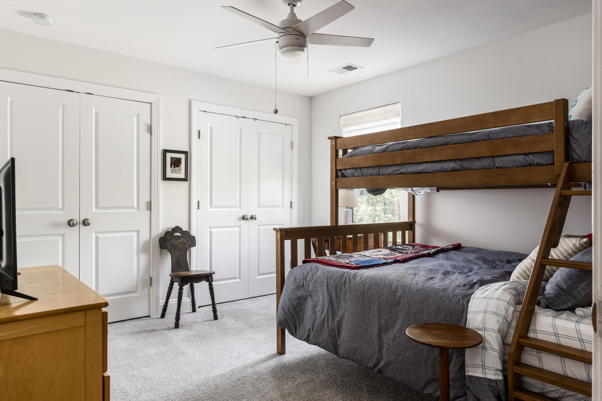 8033 Still Spg Rdg Drive Nashville, TN 37221 - Photo 28 of 36 a bedroom with a bed and a chair