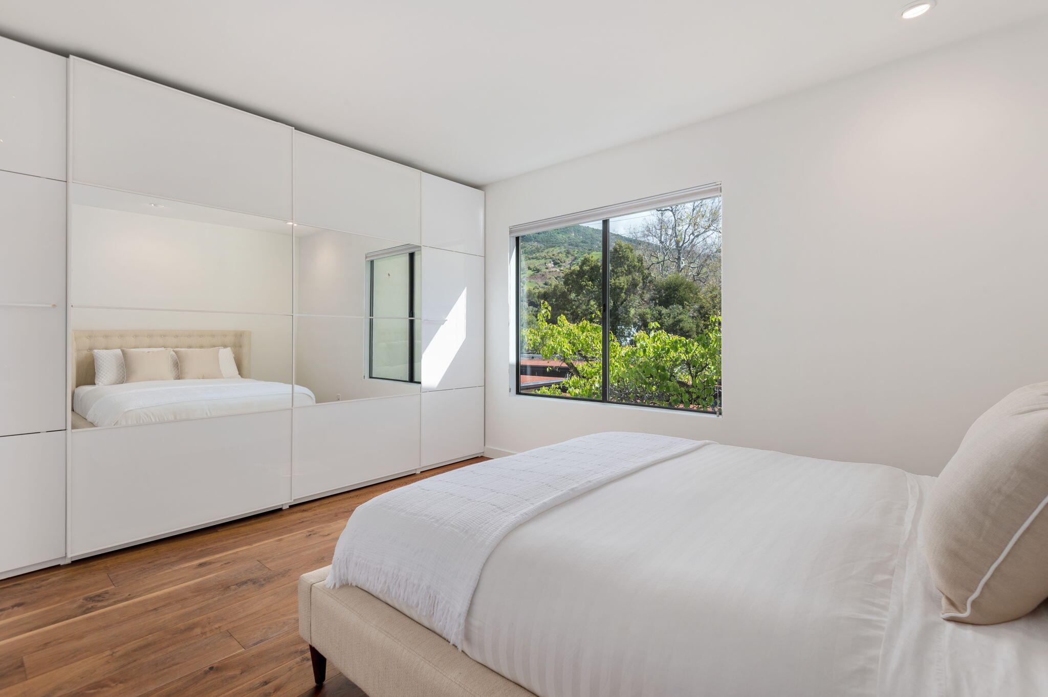 3375 Foothill Road, Unit 233 Carpinteria, CA 93013 - Photo 11 of 21 a bedroom with a large bed and a window