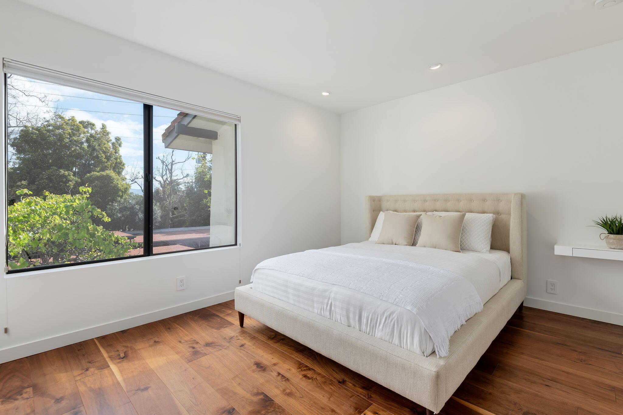 3375 Foothill Road, Unit 233 Carpinteria, CA 93013 - Photo 12 of 21 a large bed sitting in a bedroom next to a window