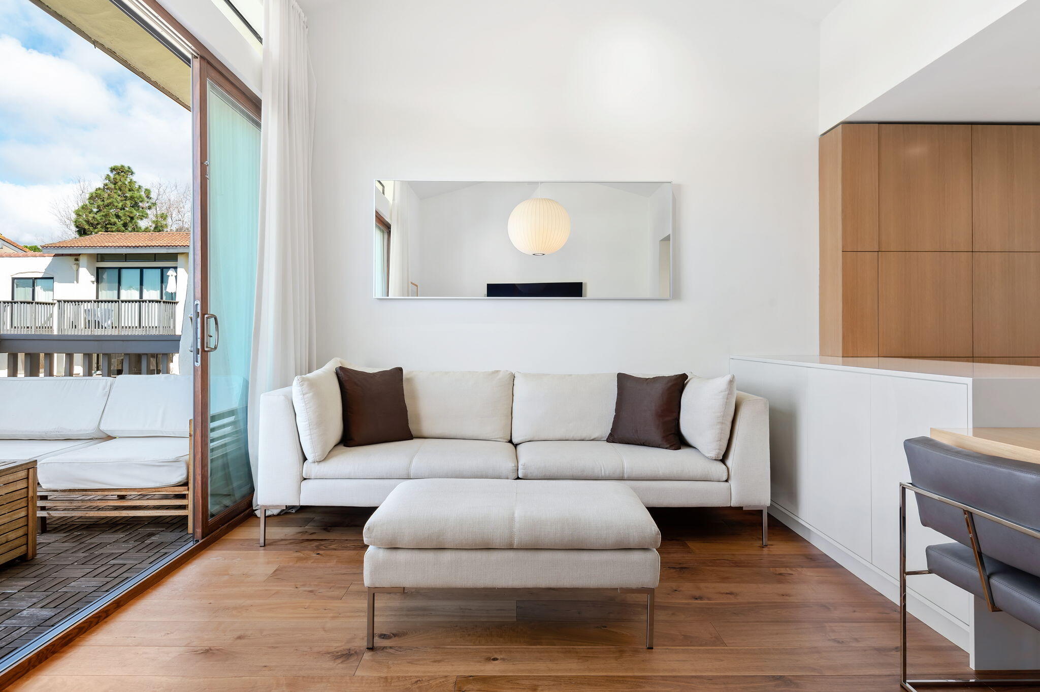 3375 Foothill Road, Unit 233 Carpinteria, CA 93013 - Photo 6 of 21 a living room with furniture and a window