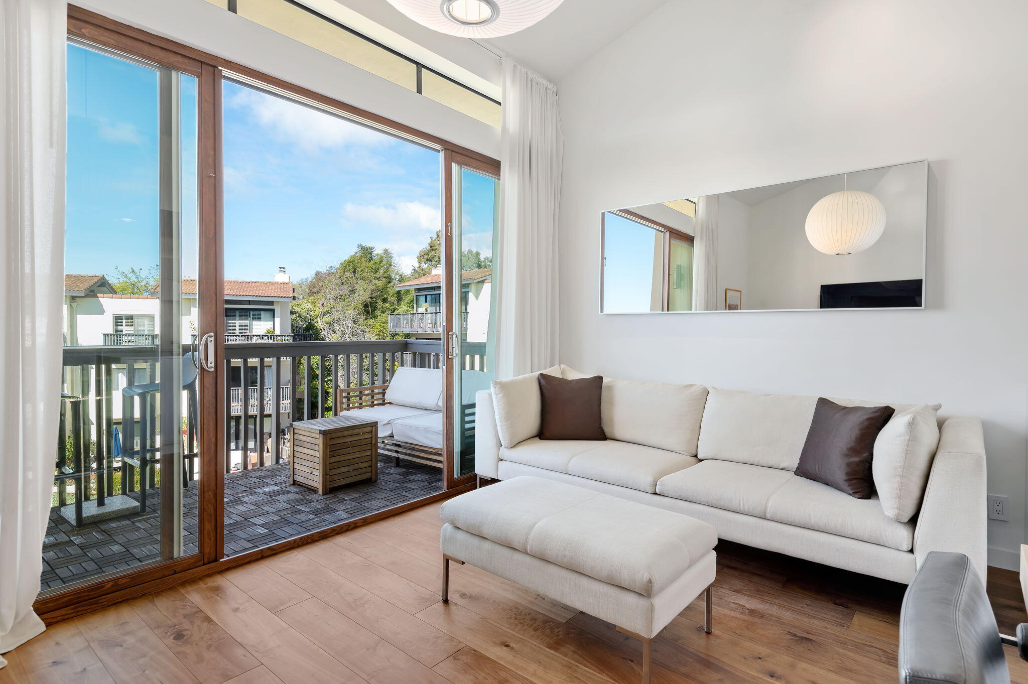 3375 Foothill Road, Unit 233 Carpinteria, CA 93013 - Photo 7 of 21 a living room with furniture and a large window