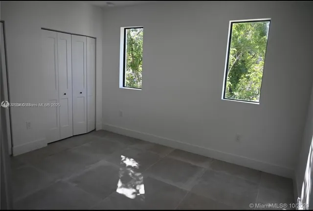 an empty room with a window