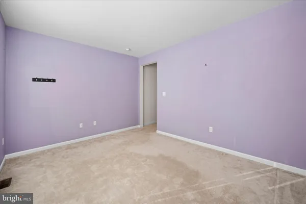 an empty room with an entryway