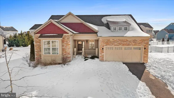 a front view of a house with yard