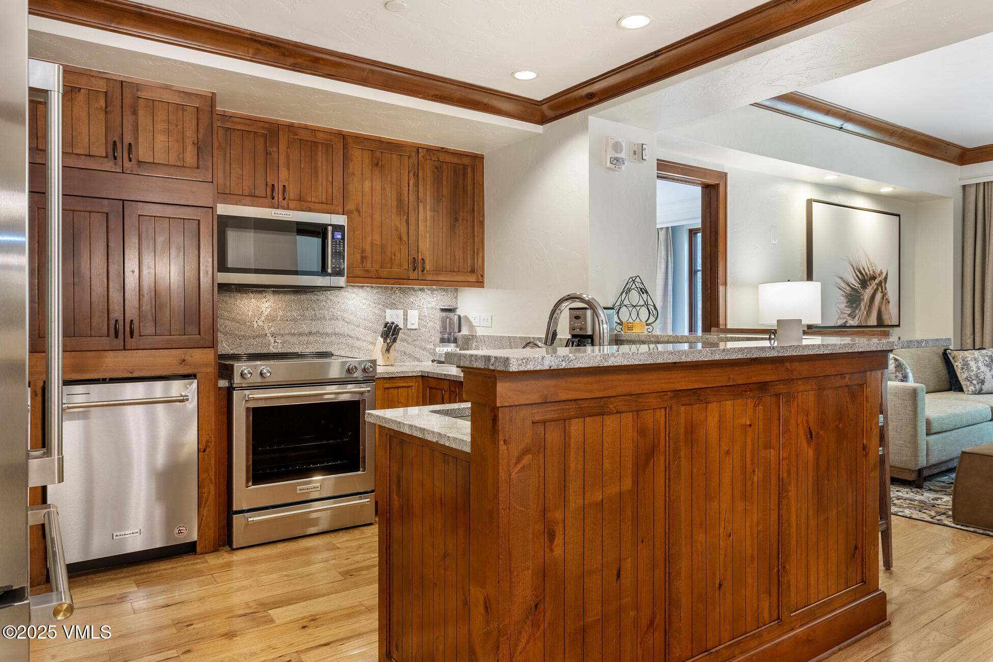 100 Bachelor Ridge Road, Unit 3403 Avon, CO 81620 - Photo 9 of 48 a kitchen with stainless steel appliances granite countertop a refrigerator stove and sink