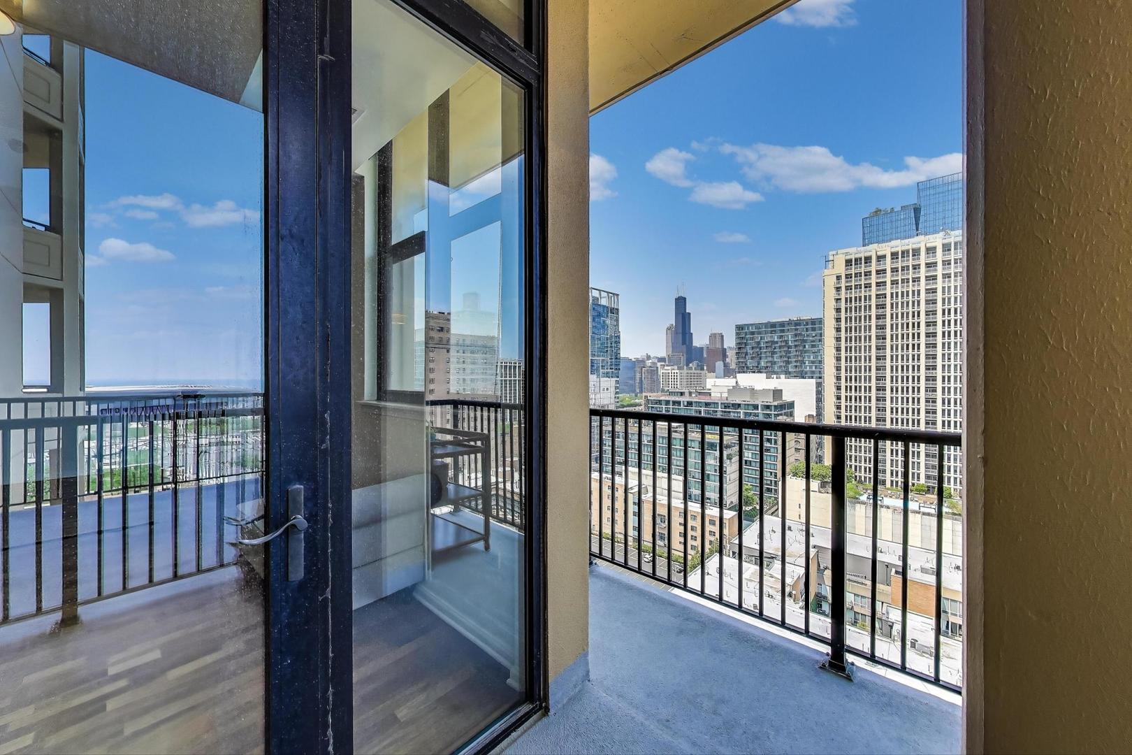 1464 South Michigan Avenue, Unit 1609 Chicago, IL 60605 - Photo 19 of 45 a view of a balcony with wooden floor