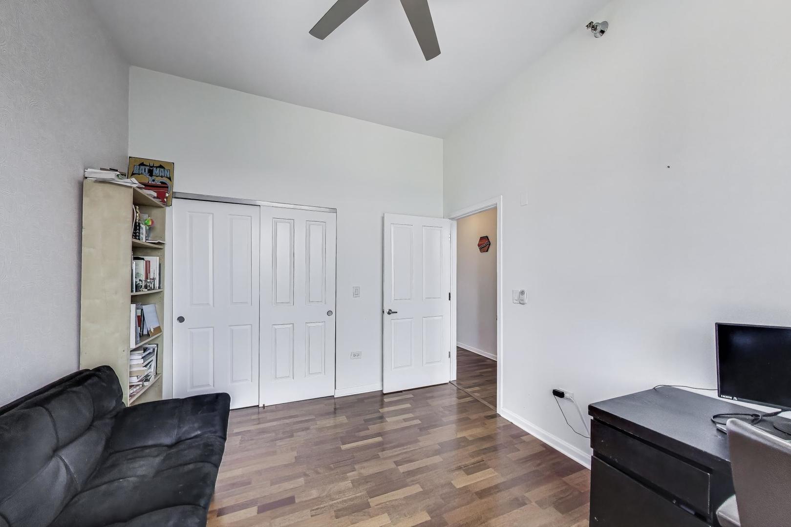 1464 South Michigan Avenue, Unit 1609 Chicago, IL 60605 - Photo 34 of 45 a view of workspace with furniture and wooden floor