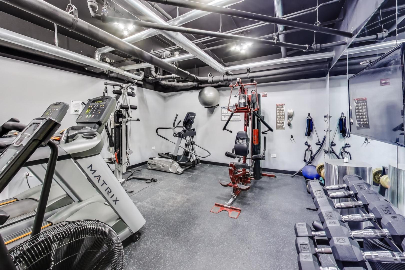 1464 South Michigan Avenue, Unit 1609 Chicago, IL 60605 - Photo 42 of 45 a view of a room with gym equipment