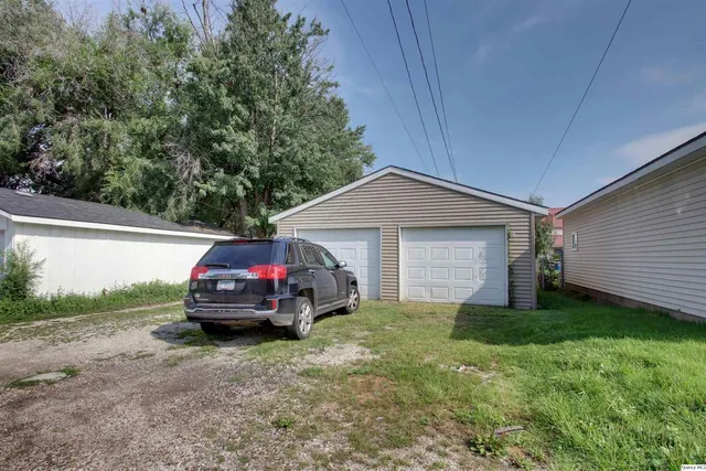 a car parked in front of a house