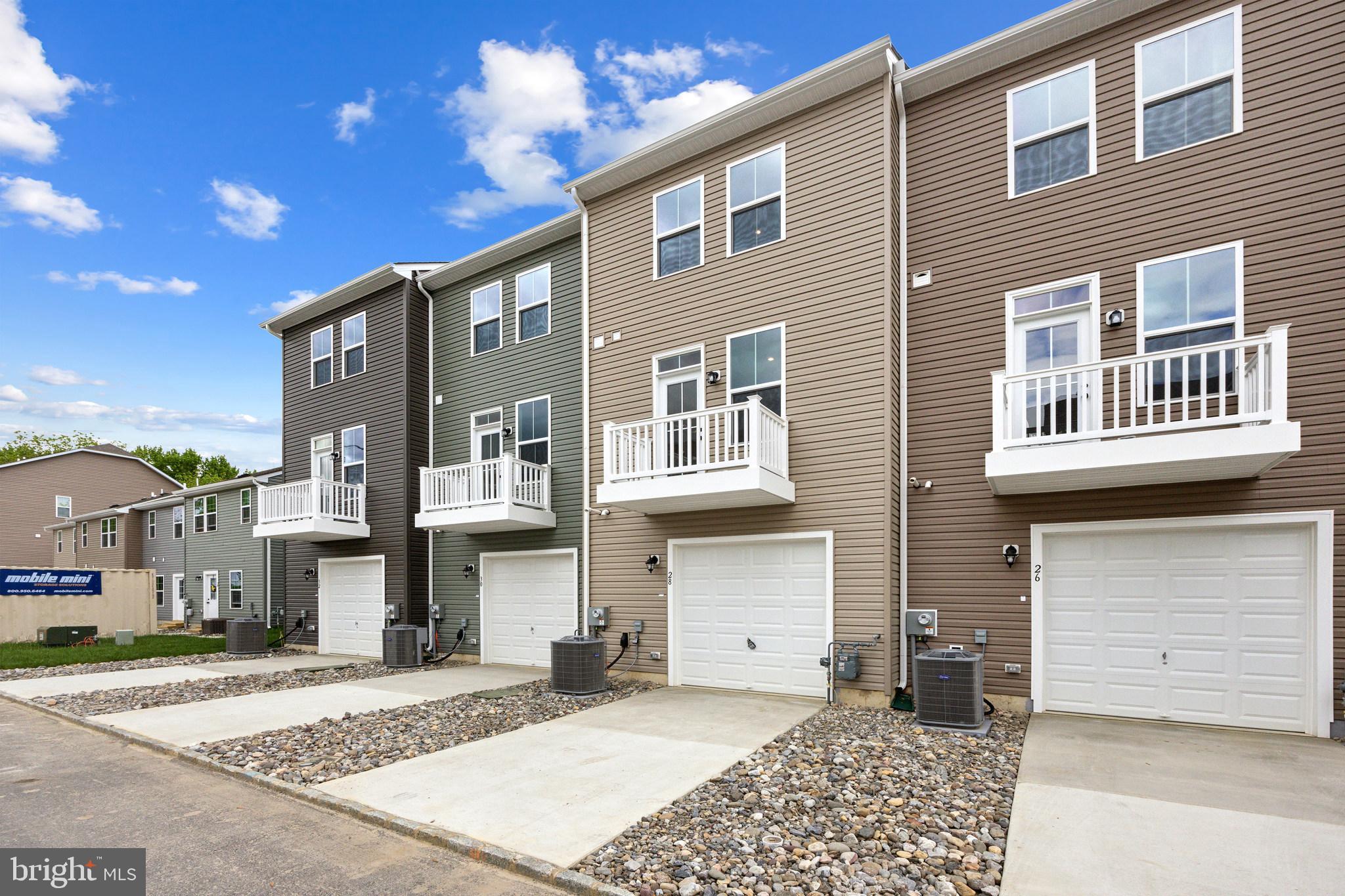 28 Sidney Lane Stratford, NJ 08084 - Photo 29 of 30 a front view of a house with a yard