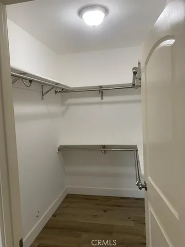 a view of an empty walk in closet