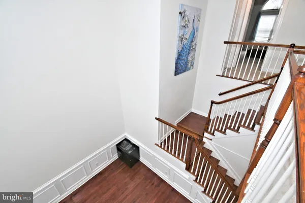 a view of entryway with wooden floor