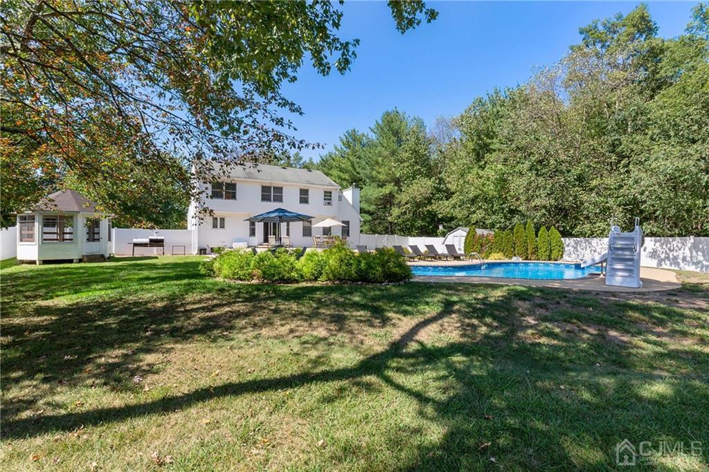 461 Cottrell Road Old Bridge, NJ 08857 - Photo 1 of 21 a front view of a house with a yard